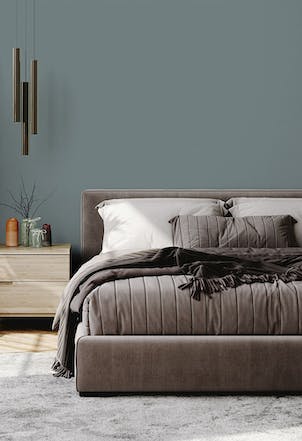 Bedroom painted with a muted grey